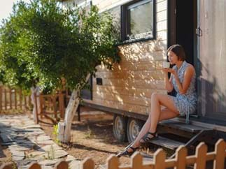 Coffee on front step of tiny house