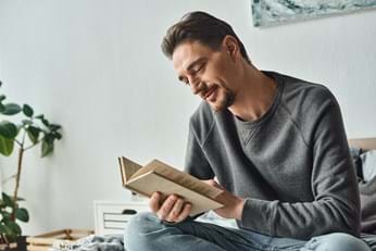 man reading a book